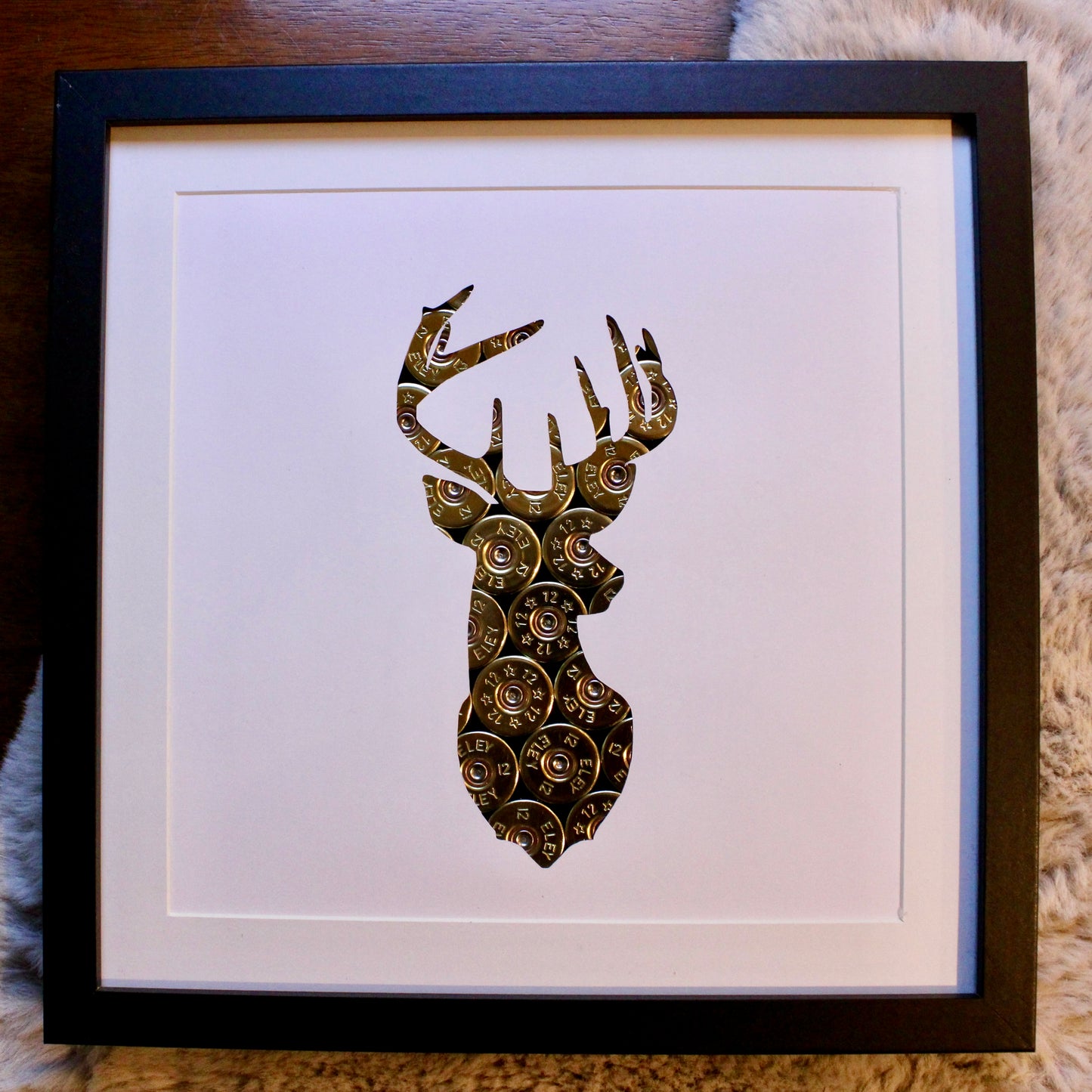 "The Stag" Backed With Spent Shotgun Cartridges