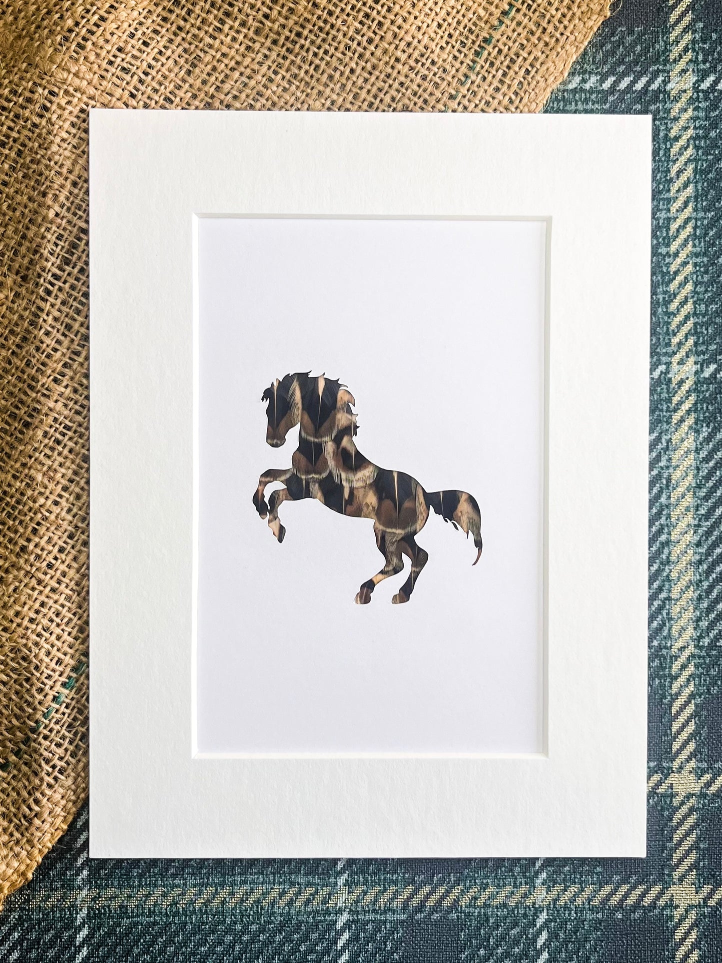 “The Rearing Horse" Backed With Pheasant Feathers