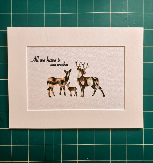 "All we have is one another" Backed With Game Bird Feathers