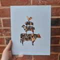 Farmyard Stack handcrafted pheasant feather artwork  
Unique arrangement of real pheasant feathers in Farmyard Stack wall art  
Farmyard Stack artwork displayed in a country-style home setting  